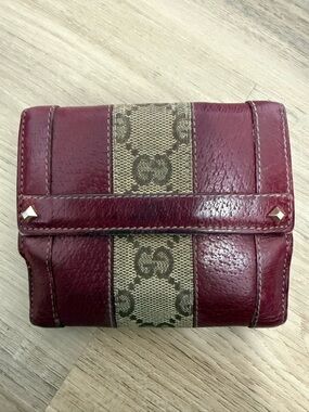 Gucci GG Canvas and Leather French Flap Wallet.